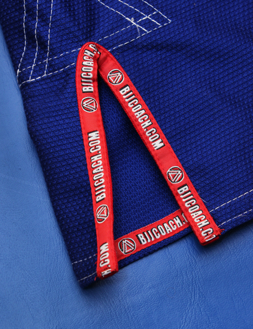 Logo accents on the BJJ Jacket and pants of the BJJ Association Gi