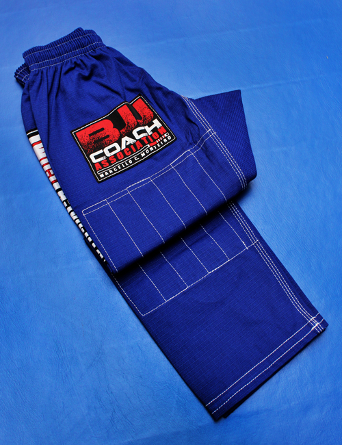 Folded pants of the Kids' BJJ Association Gi - Elite in blue