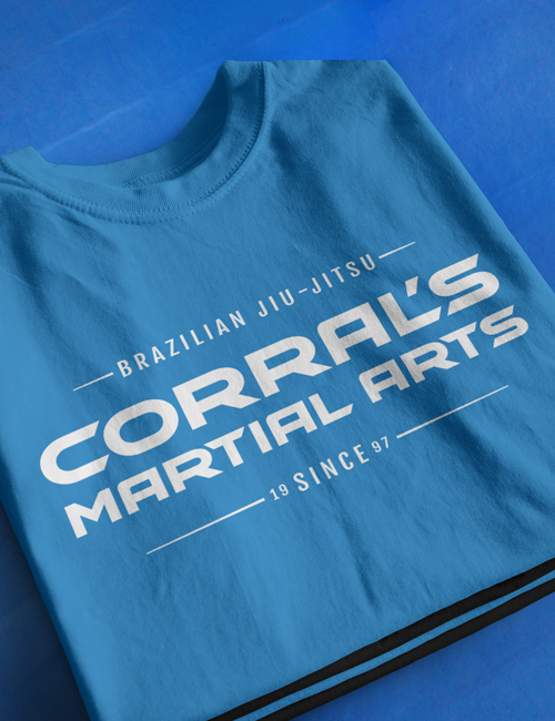Blue tournament t-shirt for Corral's Martial Arts