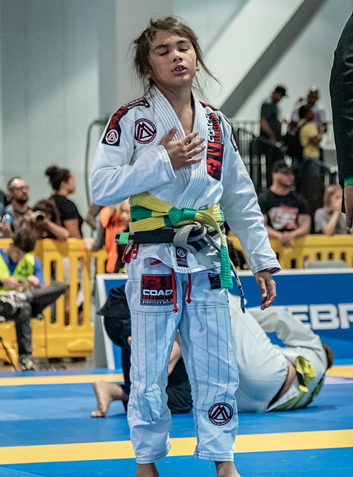 Young kid winning a Kid's Brazilian Jiu-jitsu tournament