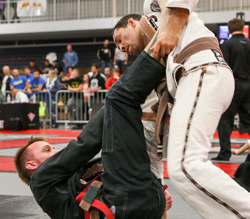 BJJ brown belts rolling at a Northwest Indiana grappling tournament