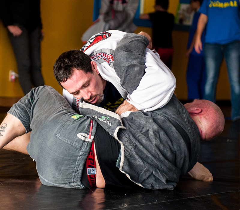 BJJ black belts rolling at Corral's Martial Arts