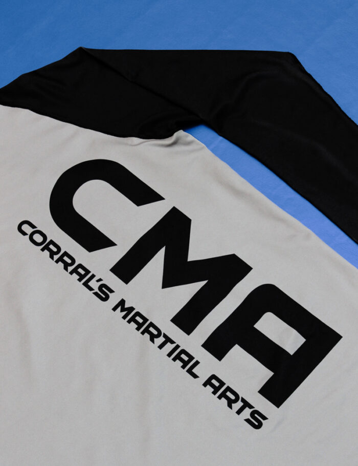 CMA Dark Colored Long Sleeve Rashguard closeup